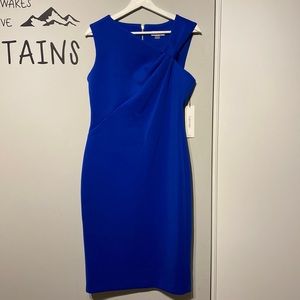 Calvin Klein, size 10, tag intact, brand new, dress. Beautiful blue Color.